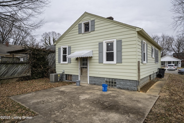 114 E Norwood Ave, Clarksville, IN 47129 - rear view of property with central AC and a patio
