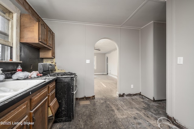 114 E Norwood Ave, Clarksville, IN 47129 - kitchen featuring dark hardwood / wood-style floors and black gas stove