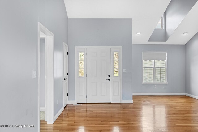 entryway with light hardwood / wood-style flooring