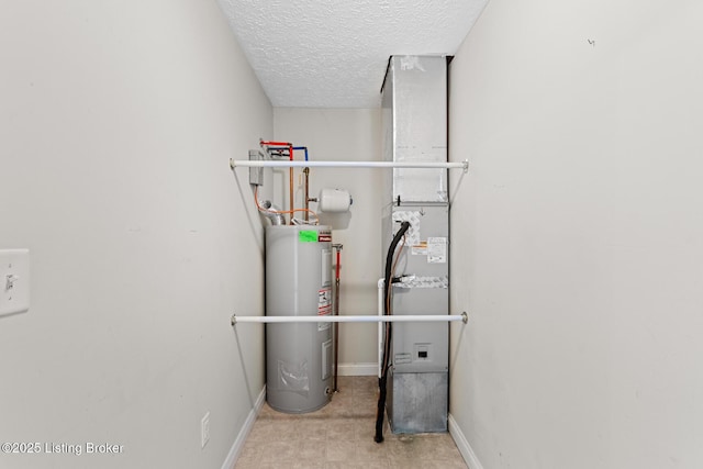 utility room featuring electric water heater