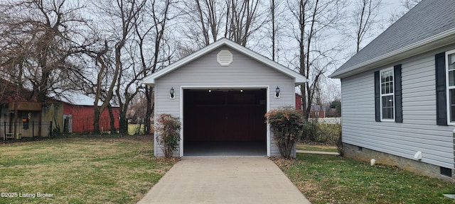 garage with a lawn