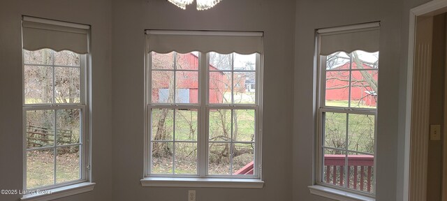 doorway to outside featuring plenty of natural light