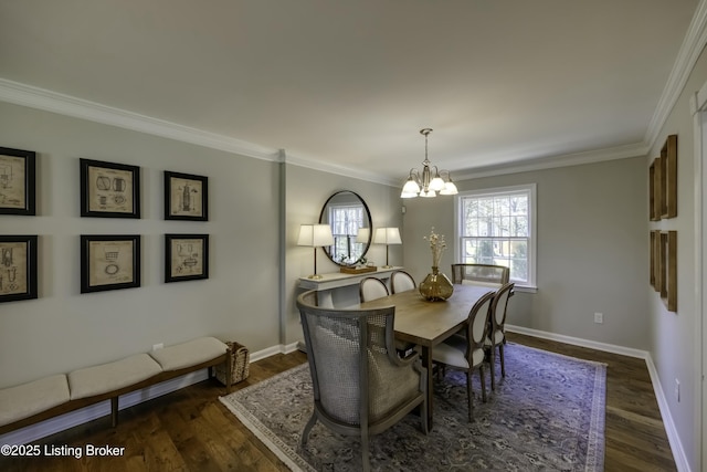 dining area featuring crown molding, an inviting chandelier, and dark hardwood / wood-style flooring