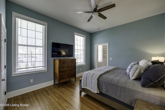 bedroom featuring ceiling fan and hardwood / wood-style floors