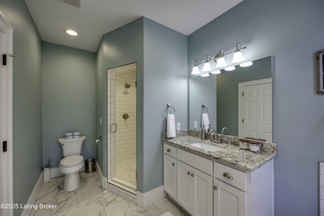 bathroom with walk in shower, vanity, and toilet