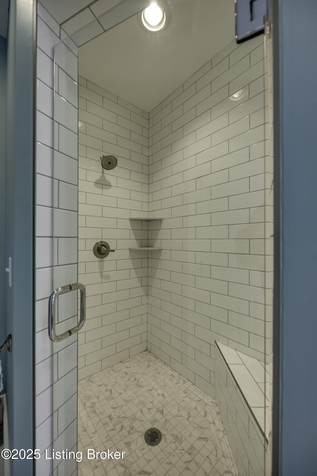 bathroom featuring walk in shower