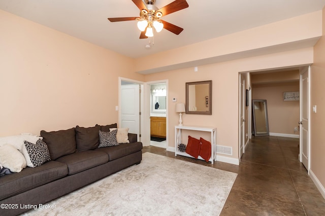 living room featuring ceiling fan