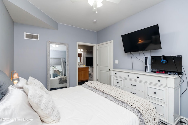 bedroom featuring connected bathroom