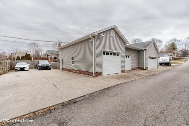 view of property exterior with a garage