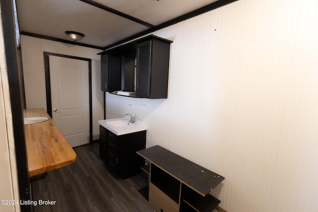 bathroom with sink and hardwood / wood-style floors