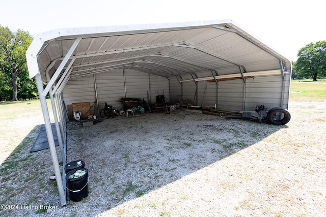 view of parking / parking lot with a carport