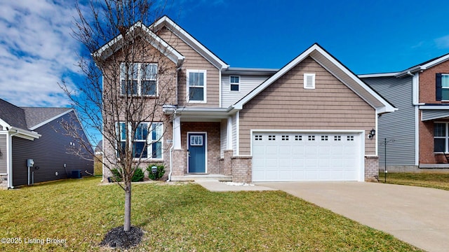 craftsman house featuring a garage and a front yard