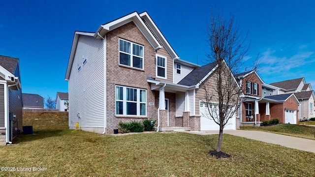 craftsman-style house featuring a garage and a front yard