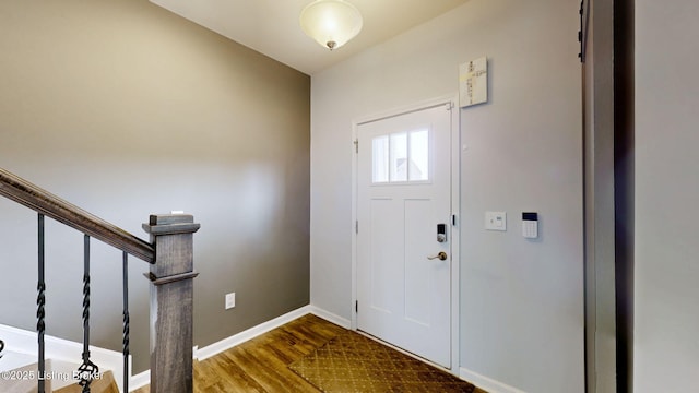 foyer entrance featuring hardwood / wood-style floors