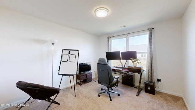 office space featuring light carpet