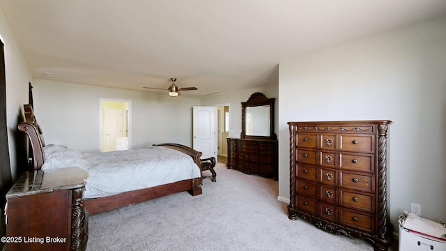 bedroom with ceiling fan and light carpet