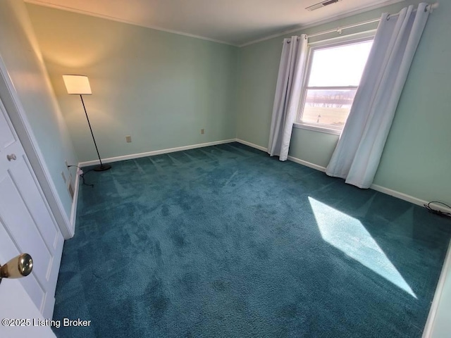 carpeted empty room featuring ornamental molding