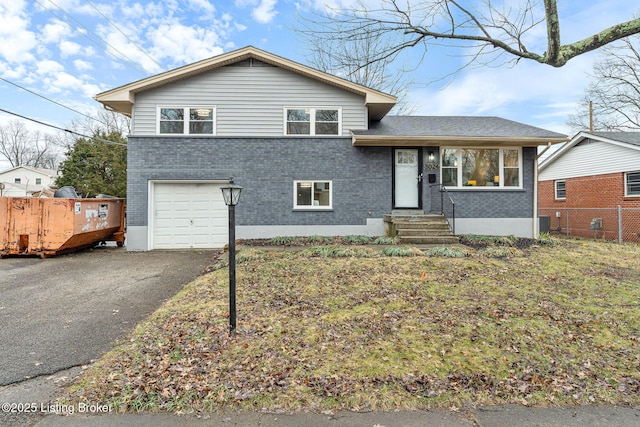 tri-level home with a garage