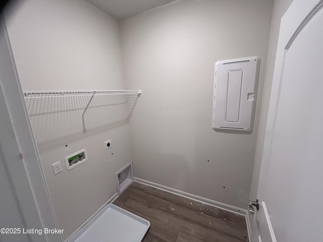 laundry room featuring washer hookup, dark hardwood / wood-style floors, electric panel, and electric dryer hookup