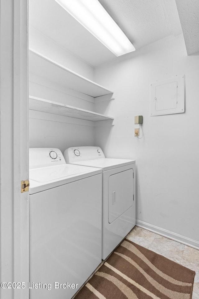 laundry room with separate washer and dryer