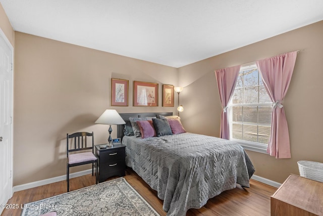 bedroom featuring wood-type flooring