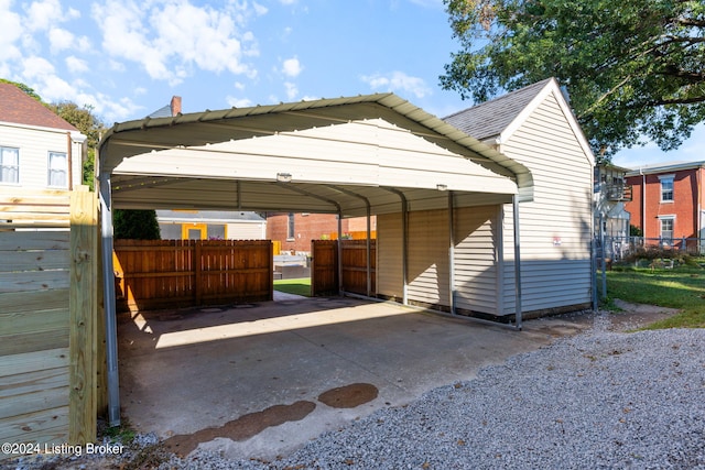 view of vehicle parking featuring a carport