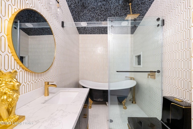 bathroom featuring vanity, shower with separate bathtub, and tile walls