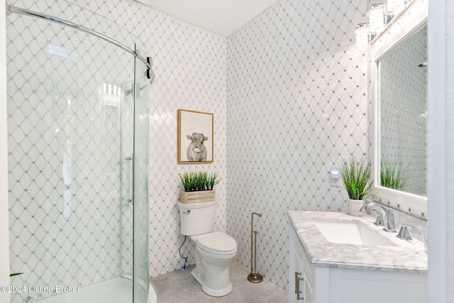 bathroom featuring vanity, tile patterned floors, toilet, and walk in shower