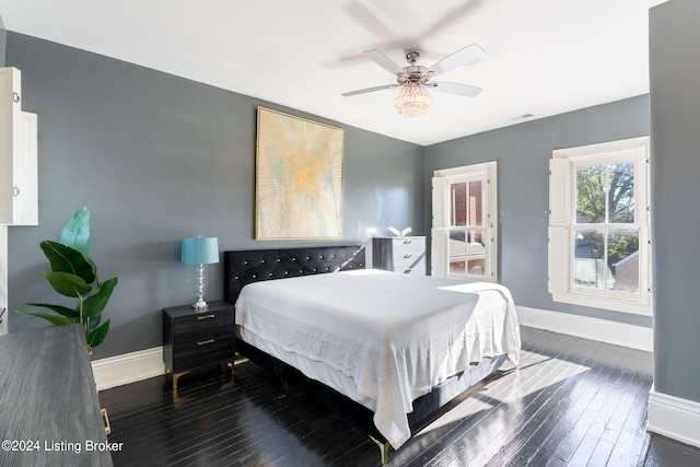 bedroom featuring dark hardwood / wood-style floors and ceiling fan