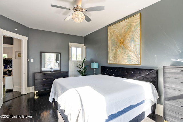 bedroom with dark wood-type flooring and ceiling fan