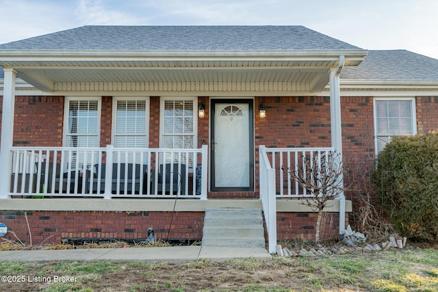 doorway to property with a porch