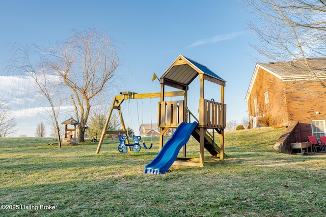 view of jungle gym featuring a lawn