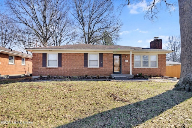 single story home with a front lawn