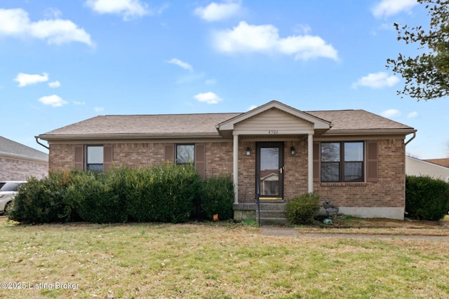 view of front of home featuring a front lawn