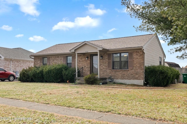 ranch-style house featuring a front lawn