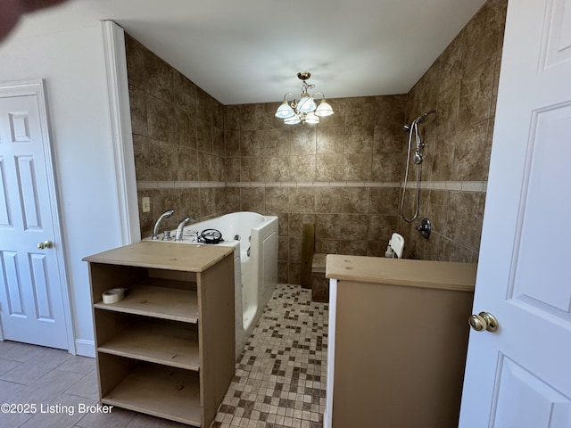 bathroom with tile walls, tile patterned floors, shower with separate bathtub, and a chandelier