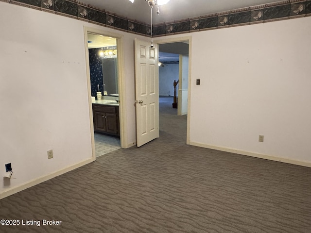 carpeted empty room with sink