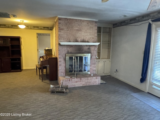 living room featuring carpet and a fireplace