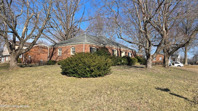 view of property exterior featuring a yard