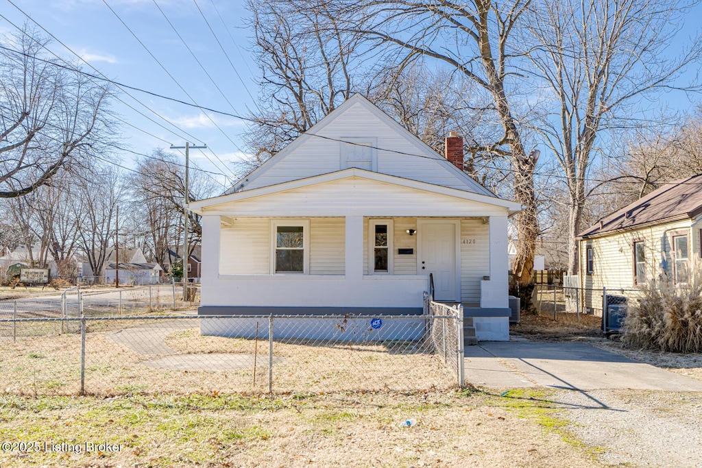 view of front of property featuring covered porch