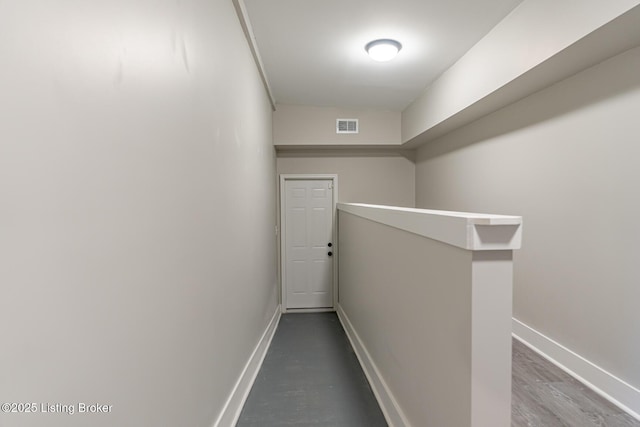 hallway featuring hardwood / wood-style flooring