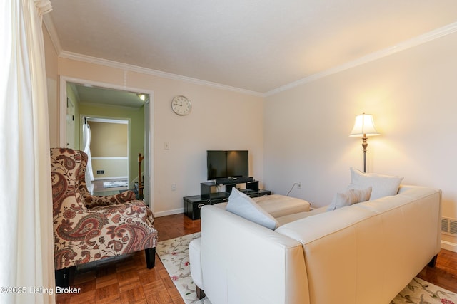 living area with visible vents, crown molding, and baseboards