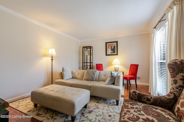 living room featuring crown molding and baseboards