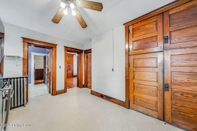 interior space with light floors and baseboards