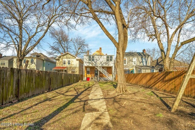 view of yard featuring a fenced backyard