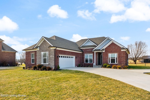 view of front of house with a garage and a front lawn