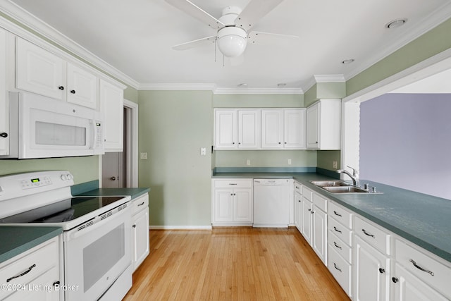 kitchen featuring white cabinetry, white appliances, ornamental molding, and sink