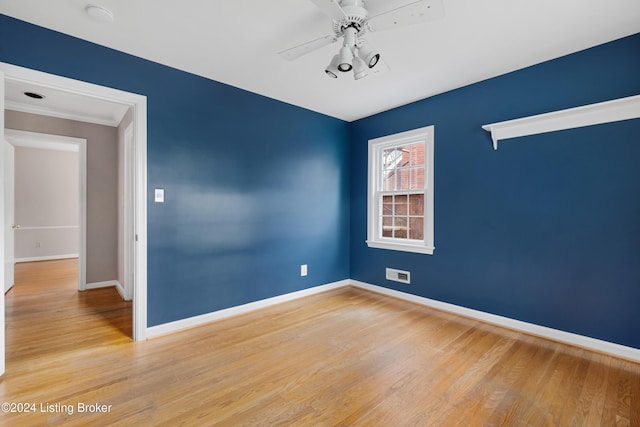 unfurnished room with light hardwood / wood-style floors and ceiling fan