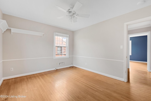 unfurnished room featuring ceiling fan and light hardwood / wood-style floors