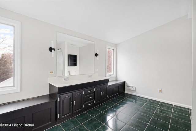 bathroom with vanity and tile patterned floors